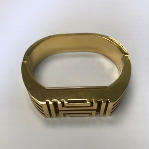 Tory Burch For Fitbit 16k gold Hinged Bracelet.